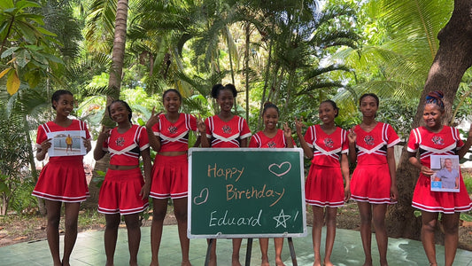 Red Spirit Cheer Crew performing a high-energy cheerleader-style personalized celebration video