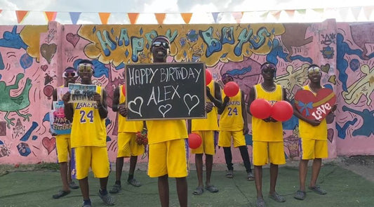 African Lakers Crew delivering a basketball-themed personalized celebration video in Lakers-style outfits