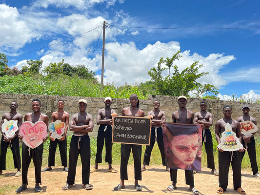 Shockwave Celebration Crew — energetic African performers delivering a powerful celebration dance in camouflage outfits